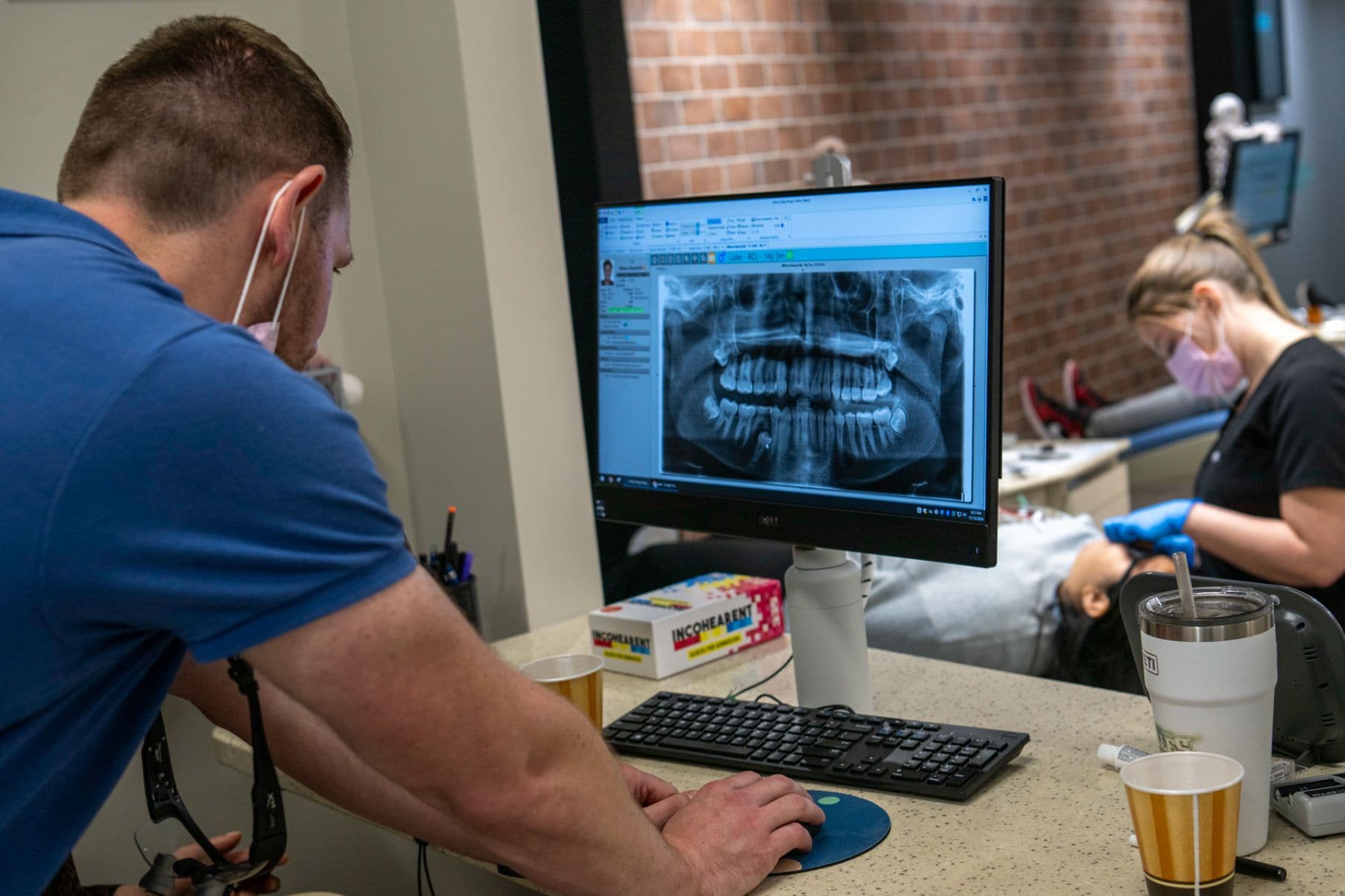 Dr. Greg working on a patient